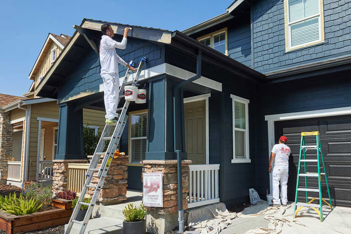 Expert painters applying high quality paint on home walls in Dubai