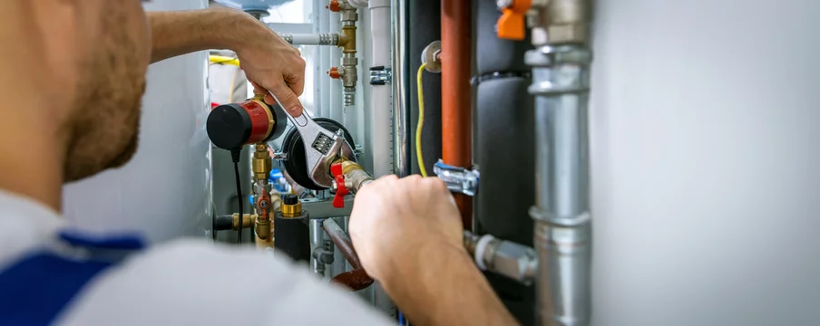 Skilled plumber fixing a leak in a residential property in Dubai