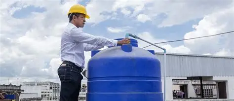 Professional repairing a residential water pump in Dubai